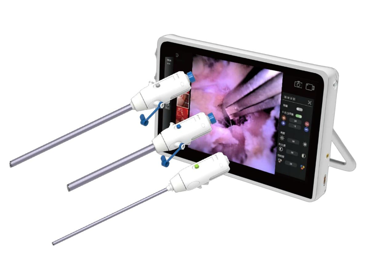 Three TISE single-use digital scopes in front of the portable touch console, which shows a live Full HD endoscopic view